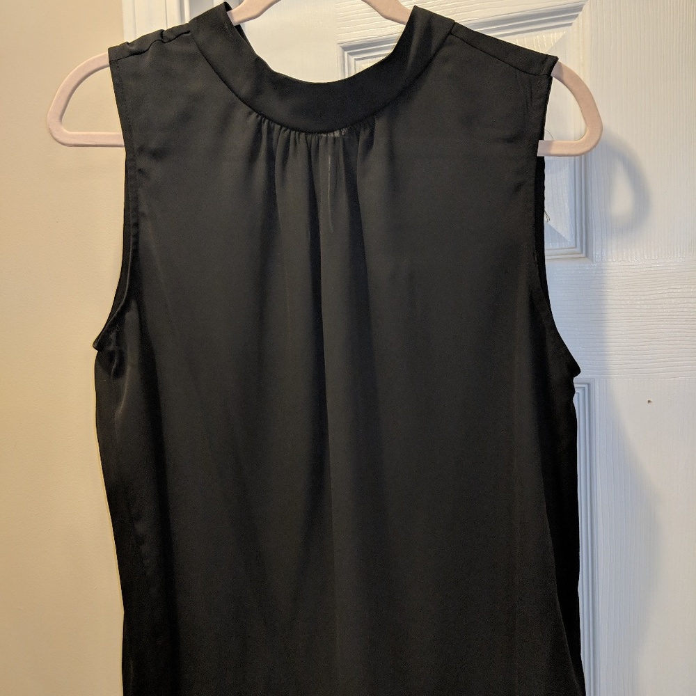 Sleeveless black blouse